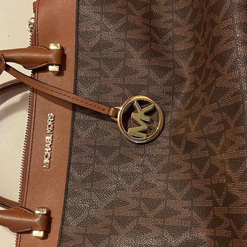 Michael Kors leather bag with handles and removable strap. Lightly used.